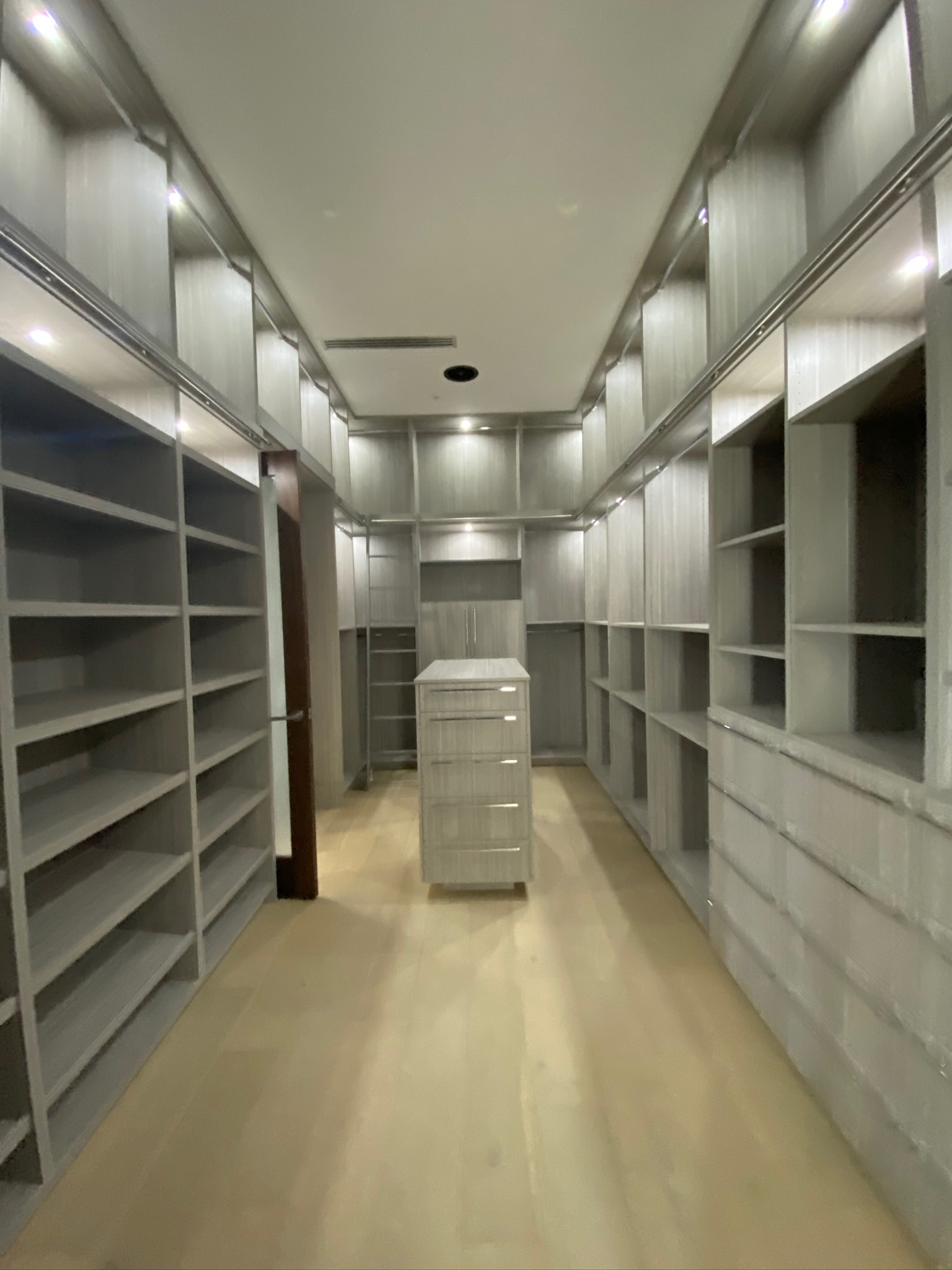 Custom walk-in wardrobe built by RMK Builders