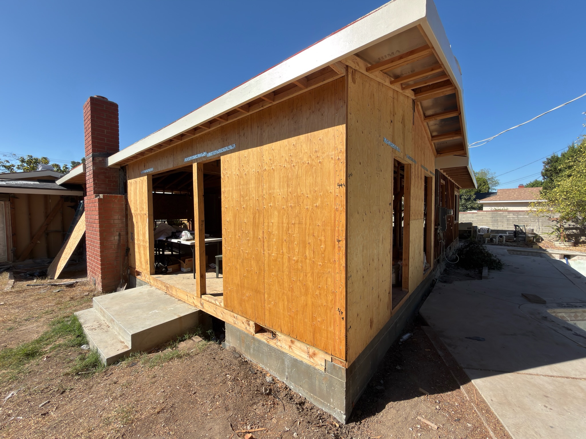 Exterior framing during a full-home renovation by RMK Builders